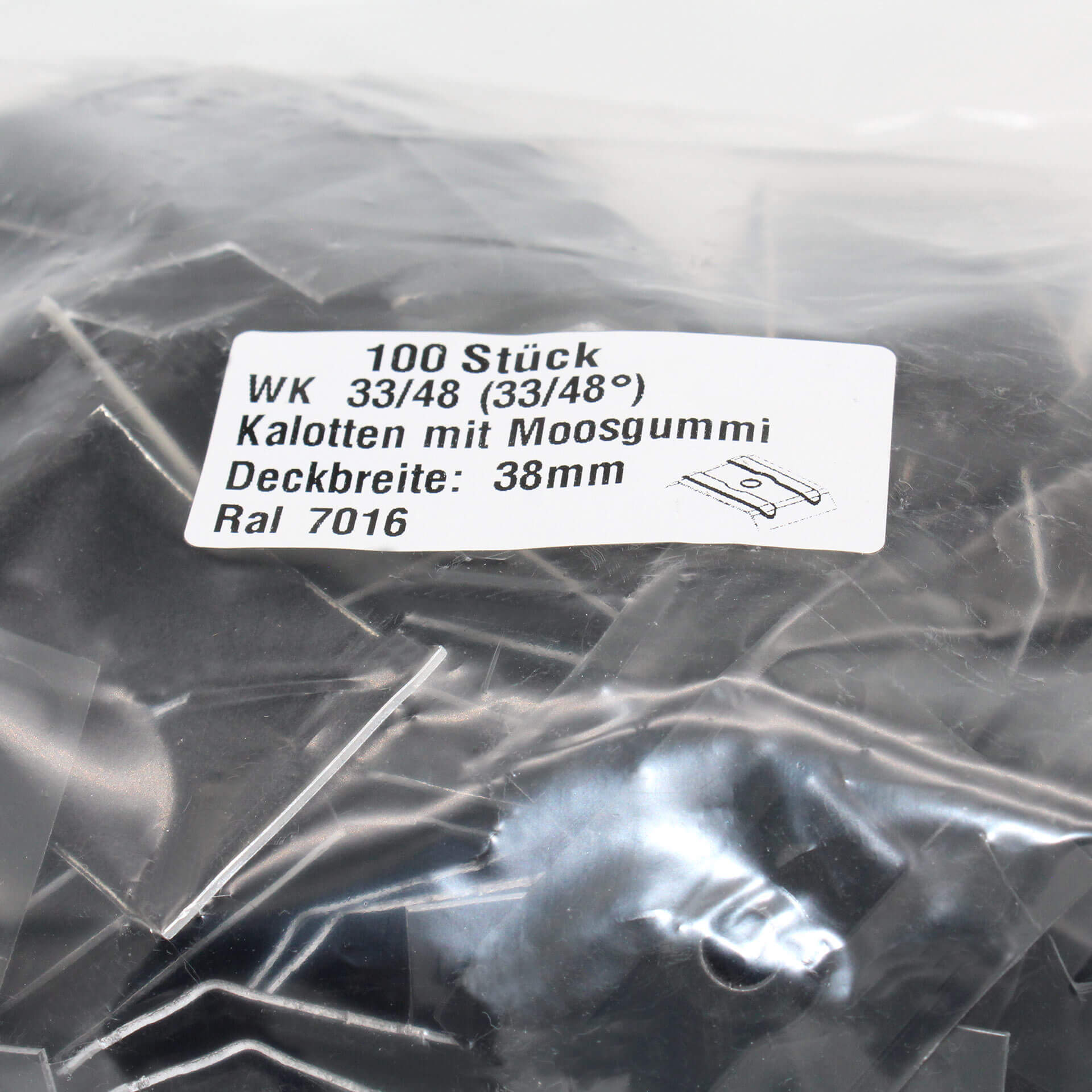 Verpackung mit Kalotten in Grau, 33/48. Auf dem Aufkleber steht der Inhalt und technische Daten.