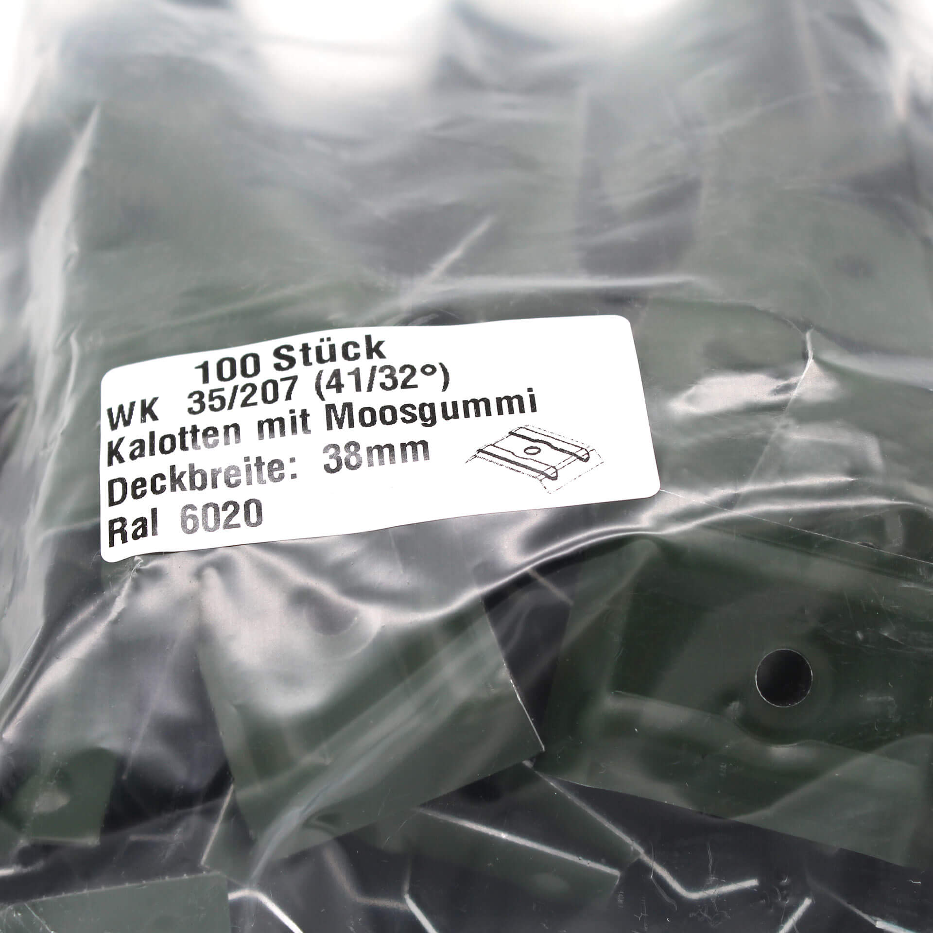 Verpackung mit Kalotten in Moosgrün. Auf dem Aufkleber steht der Inhalt und technische Daten.